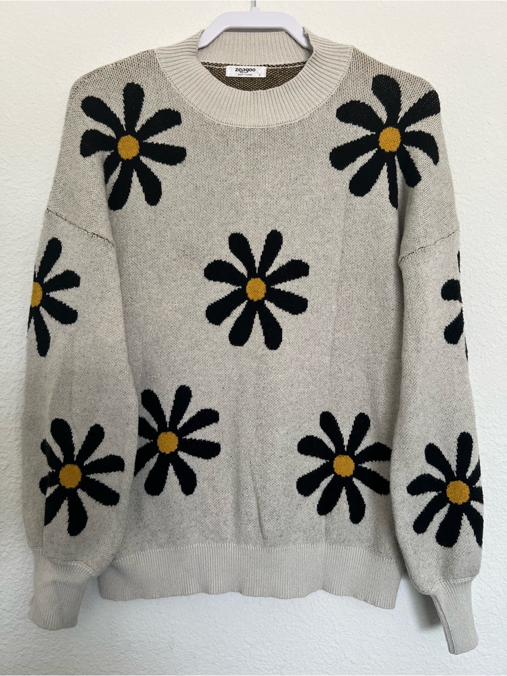 zeagoo Cream Sweater with Black Daisy Motifs and Yellow Centers